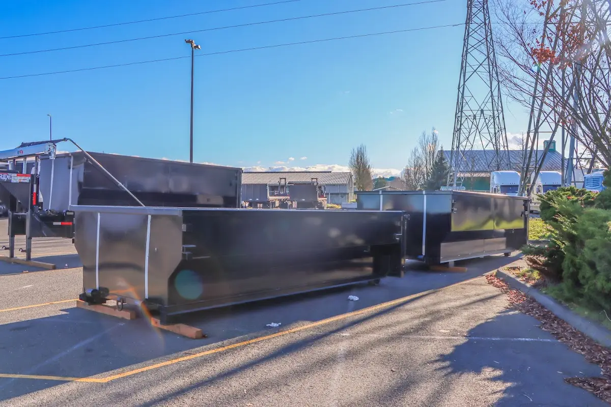 Roll-off dumpster ready for waste disposal at job site for Commercial Dumpster Rental in Grafton